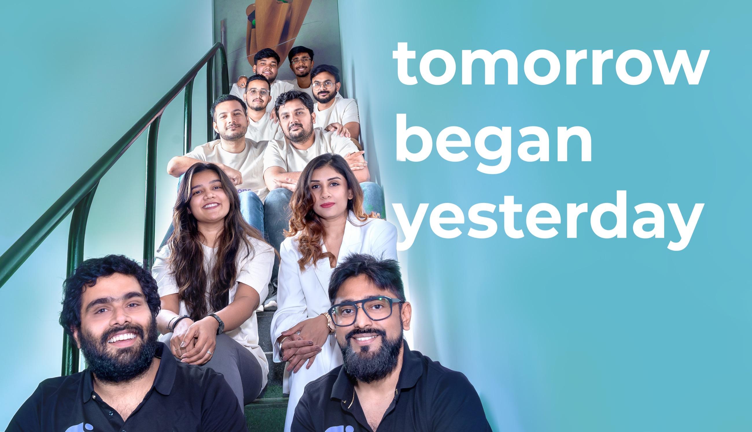 The Attentions team on the office staircase: tomorrow began yesterday